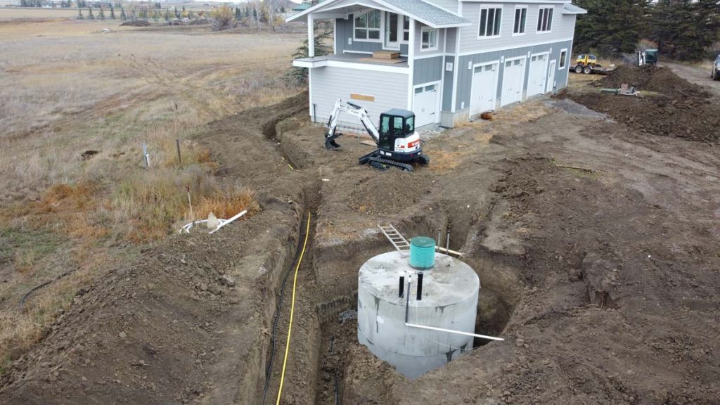 septic system installed in excavated hold on farm